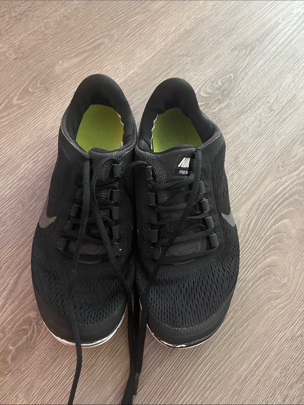 Nike Women’s Black Athletic Sneakers with Lime Insoles